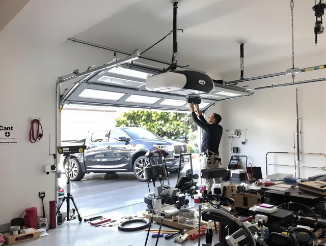 Barberton Garage Door Repair specialist installing smart garage door opener system in Barberton home
