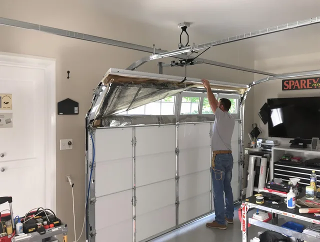 Garage door section replacement by Barberton Garage Door Repair in Barberton
